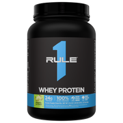 Front view of a black protein powder container with a blue label featuring a large number 1